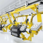 Engine in yellow overhead frame